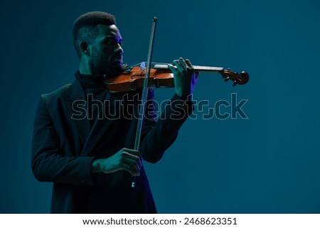 Similar – Image, Stock Photo Man playing violin with face mask