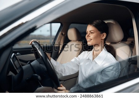 Similar – Image, Stock Photo Woman sitting on driver seat and putting on gloves