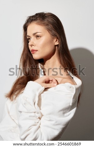 Similar – Image, Stock Photo Stylish tranquil woman against blue sky