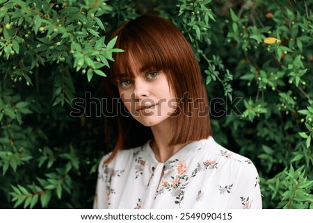 Image, Stock Photo Lovely redhead woman enjoying the day in a field o sunflowers