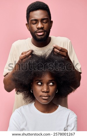 Similar – Image, Stock Photo Intimate portrait of afro latina with shadows in face