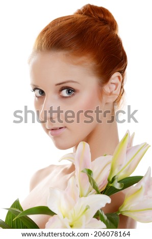 Beautiful girl with pink lilies on white background