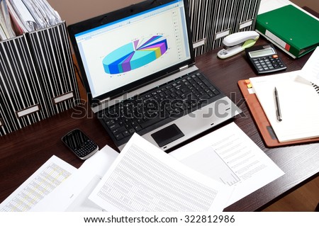 Business working - manager works in the office until late hours with documents,\
office work,