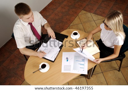 Meeting On Business. Documents on the table. Business call Team work to late hours.