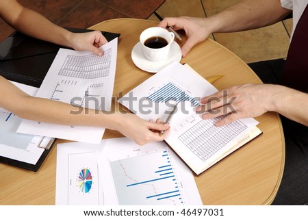 Office. Meeting On Business. Documents on the table. Business call. Team work to late hours.