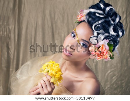 Behind the curtains (portrait of a young beautiful actress with fantasy makeup and flowers)
