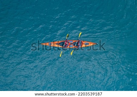 Similar – Image, Stock Photo Two kayaks on the water with reflection