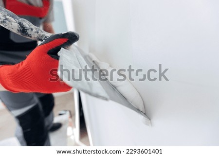 Similar – Image, Stock Photo Craftsman working with plaster in art studio