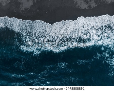 Similar – Image, Stock Photo Picturesque view of black sand beach against cloudy sky