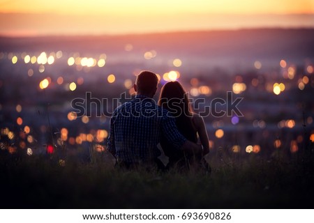 Similar – Foto Bild Ein perfekter Sommertag für eine fröhliche Abkühlung in der grünen Natur. Ein wunderschönes blondes Mädchen in einem weißen Hemd fühlt sich glücklich und entspannt zwischen den Blumen. Sommerglück und die unendliche Schönheit der Natur in diesem Bild.