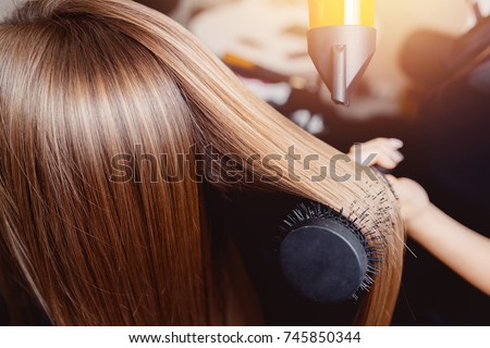 Close-up of hair dryer, concept cut salon, female stylist. Сток-фото © 