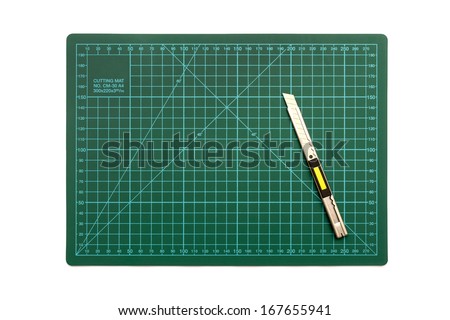green cutting mat on a white background