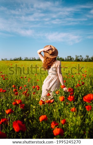 Similar – Foto Bild Frau in rotem Blumenkleid umarmt einen Baum.