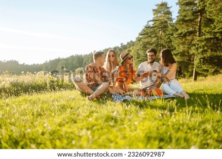 Similar – Image, Stock Photo Resting outdoor. Group of family members is walking in the field.  Zickental, Rohr, Southern Burgenland, Austria