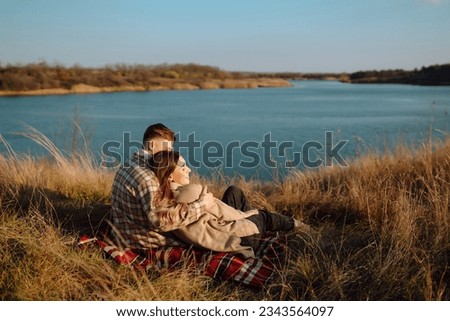 Similar – Image, Stock Photo Romantic couple enjoying camping together in nature