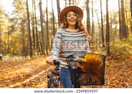 Similar – Foto Bild frau auf dem fahrrad mit fisch