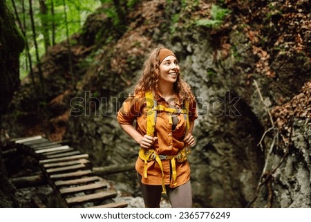 Similar – Image, Stock Photo backpacker woman hiking outdoors with cute poodle dog. Snowy mountain in winter season. nature, pets and lifestyle