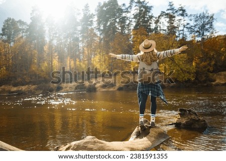 Similar – Image, Stock Photo Young woman hiking in autumn