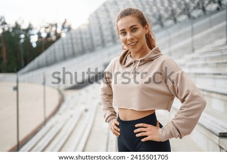 Similar – Image, Stock Photo Fit female athlete doing bound angle pose