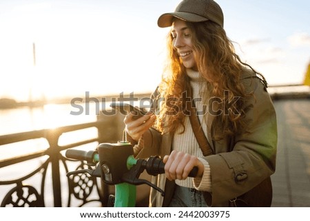 Similar – Image, Stock Photo Activating electric scooter from smartphone