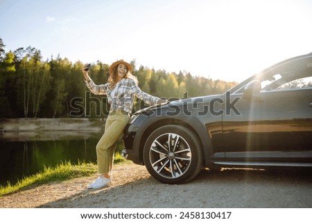 Similar – Image, Stock Photo Thoughtful young female tourist standing on rocky seashore and looking away