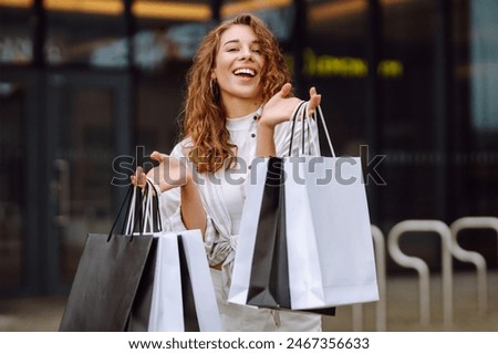 Similar – Image, Stock Photo Trendy woman with bag standing near lake