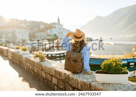 Similar – Image, Stock Photo female traveler admiring a marine view. tourism in Cyprus. tourist on sea background. girl travels on the beaches. young beautiful hipster woman on tropical beach, summer vacation, happy, fun,