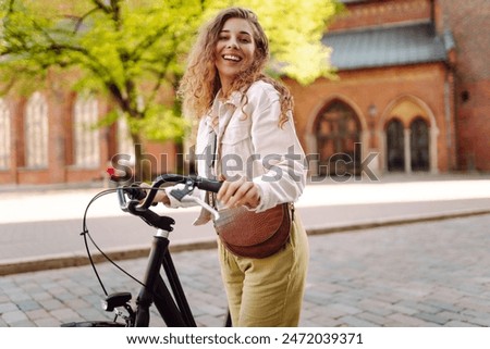 Similar – Foto Bild frau auf dem fahrrad mit fisch