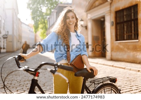 Similar – Foto Bild frau auf dem fahrrad mit fisch