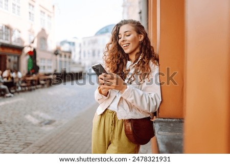 Similar – Image, Stock Photo Stylish traveling woman with backpack resting near sea