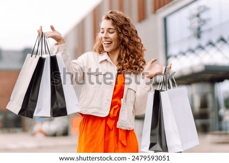 Similar – Image, Stock Photo Portrait of a cute boy basketball player standing with a ball in his hands next to the basketball Hoop. The concept of sport and a healthy lifestyle