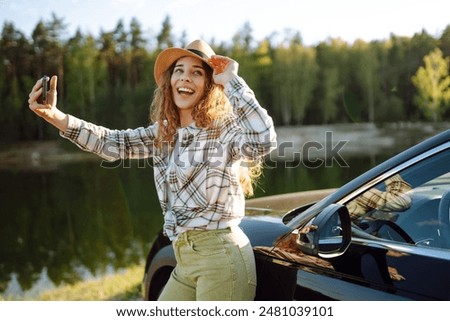 Similar – Image, Stock Photo Thoughtful young female tourist standing on rocky seashore and looking away