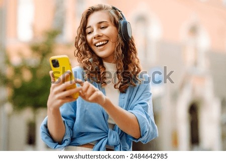 Similar – Image, Stock Photo Young woman listening to music