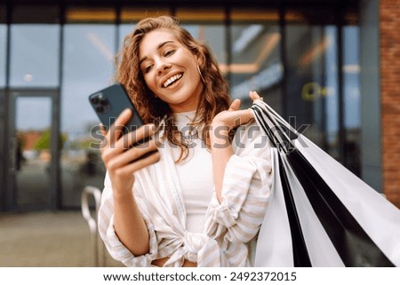 Similar – Image, Stock Photo Shopping online with a notebook on a pink background