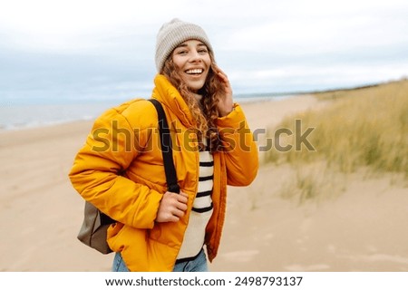 Similar – Image, Stock Photo Lone female hiker contemplating the clouds from the top of a mountain