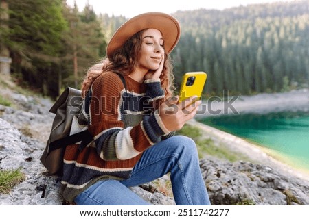 Similar – Image, Stock Photo Young woman hiking in autumn