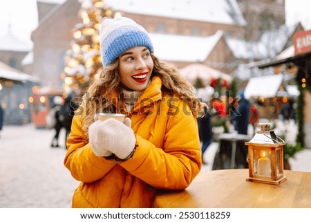 Similar – Image, Stock Photo Traveling woman warming hands near campfire on forest glade