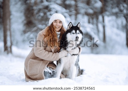 Similar – Image, Stock Photo Cheerful woman with dog in pet cone at home