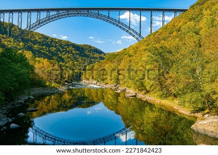 Similar – Foto Bild Stahlbruecke mit Spiegelung ueber Fluss