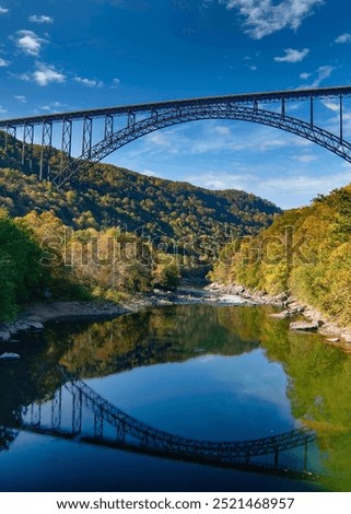 Similar – Foto Bild Stahlbruecke mit Spiegelung ueber Fluss