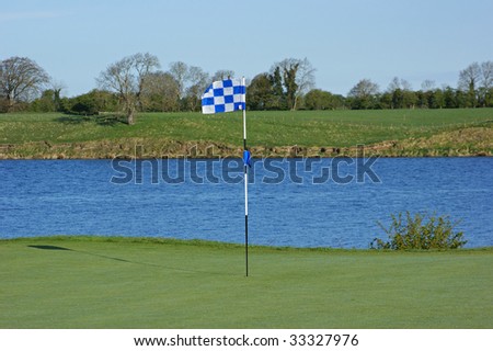 View on the golf flag and lake