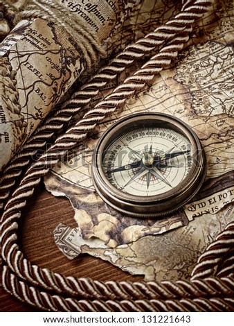 vintage  still life with compass and old map