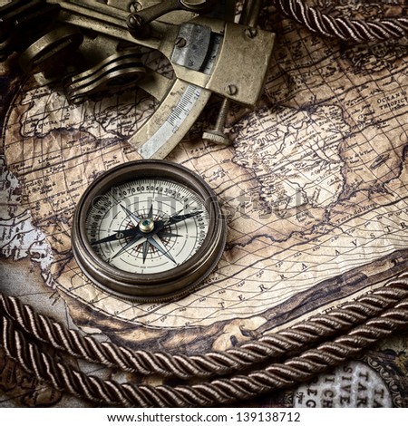 vintage  still life with compass,sextant and old map