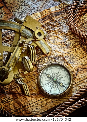 vintage  still life with compass,sextant and old map.