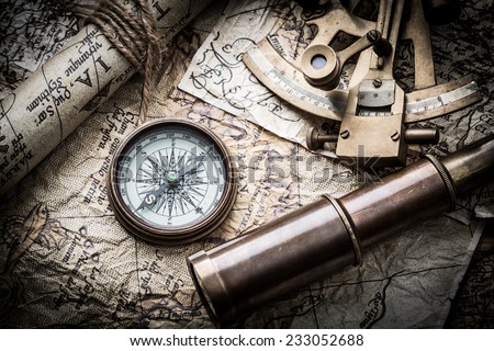 vintage still life with compass,sextant and old map. map of the 1570. Author: Abraham Ortelius (1527-1598)