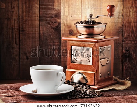 coffee beans and old coffee mill