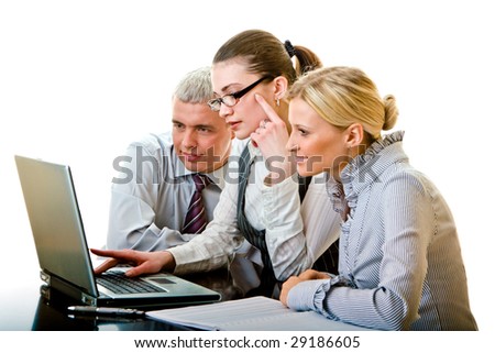 Two women and man work in group