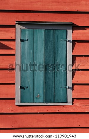 Barn Window - Colorful window background with red and blue boards.