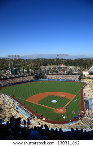 LOS ANGELES - JUNE 30: Classic view of Dodger Stadium before a sunny day baseball game on June 30, 2012 in Los Angeles, California. Dodger Stadium opened in 1962 and cost $23 million.