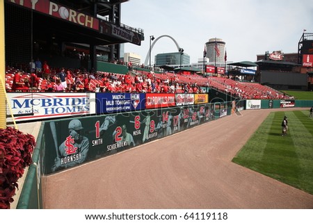 ST. LOUIS - SEPTEMBER 18: Cardinals fans vie for batting practice home run baseballs before a National League game at Busch Stadium against the San Diego Padres on September 18, 2010 in St. Louis.